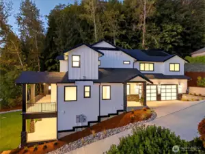 Thoughtfully designed to capture abundant natural light and panoramic Lake Sammamish views from every window, with privacy carefully preserved through strategic placement.