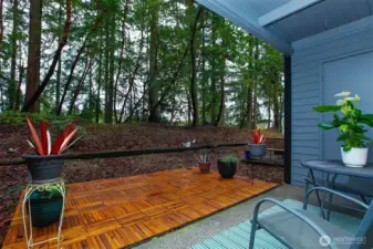 Private outdoor living with views of Chamber Creek greenbelt.