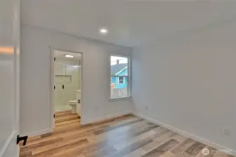 Primary bedroom toward its bathroom