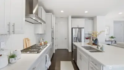 A contemporary kitchen made for both creativity and convenience.