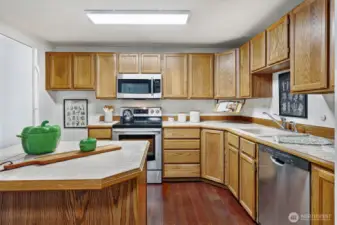 Modern kitchen with lots of cabinets & counter space.