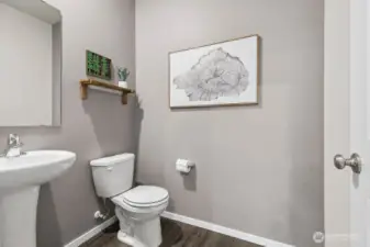 Powder room on the main floor. Photos are representative only and may display different color package and/or upgrades.