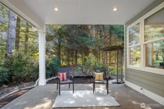 Covered patio looking out onto greenbelt.