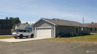 large 2 car garage with extra parking!