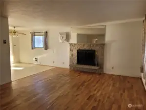 wonderful hardwoods, and wood burning fireplace in living room.