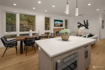 Kitchen overlooks the dining and living rooms, perfect for entertaining guests.