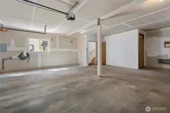 Note the EV charger and the shop space in the rear.