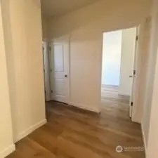 Hall to 4th Bedroom + Bath on Main/Floor 1