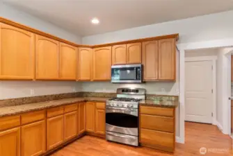 This door leads from the kitchen to the garage, laundry room