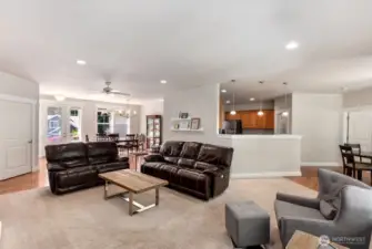 The dining room opens into this spacious living room, which is also open to the kitchen and informal dining for great flow