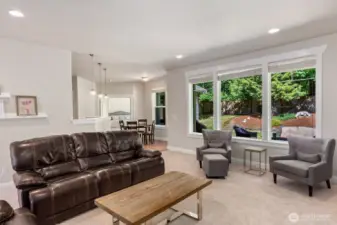 This large bank of windows brings in loads of light and offers views to the private rear patio and yard