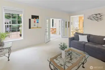 Family Room Looking Out to Breakfast Nook with Sun Room off to the Left