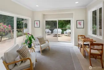 Sun Room with Screened Sliding Glass Doors to the Entertainment Deck