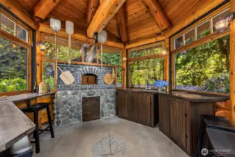 The interior of the “pizza hut” is a work of art, from the stamped concrete floor to the wood-fired oven, to the pizza-making tools. What culinary delights will you create and serve to your loved ones?
