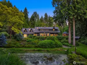 One final look at this gorgeous country home, as seen from the meadow on the far side of the pond. Truly enchanting!