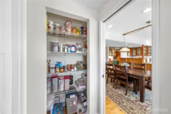 Generously sized pantry off of dining room for additional storage.