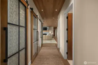 Custom barn doors add warmth and ambiance to the NW stylings.