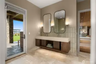 Spa-like bath with floating custom oak vanity.