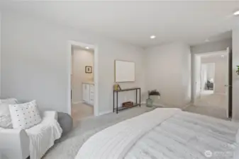 Primary bedroom is complemented with a luxurious en-suite primary bathroom.