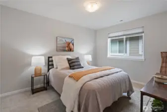 Bedroom #3 is at the end of the hallway, giving it more privacy away from the shared spaces.