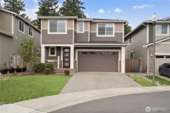 Home is nestled in a quiet cul-de-sac and backs to a peaceful greenbelt. (Green lawn digitally enhanced)