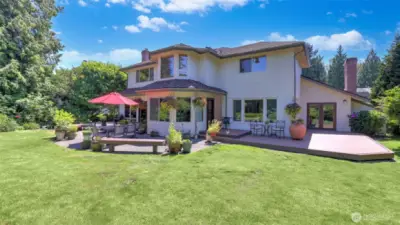 Enjoy this generous outdoor living space designed for dining, lounging, and entertaining in style. Thoughtful plantings to provide year-round color.