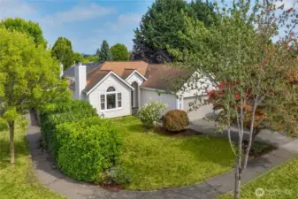 Lovely rambler on a corner lot with a 3 car garage!