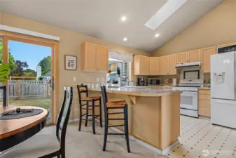 Eat in kitchen with dining area to the side.