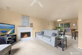 Living room & dining room with sliding glass doors that lead to the back yard.