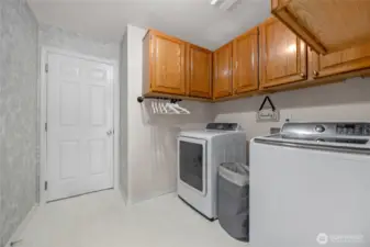 Laundry room off of the garage.