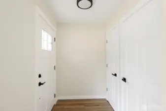 Entrance with coat closets