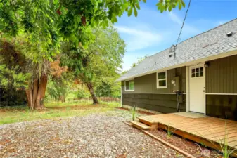Side of house with new deck and remodeled exterior