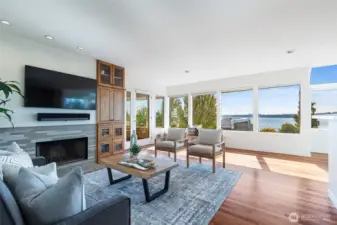 Generous living room with almost floor to ceiling windows