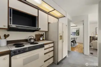 Quick look at the clean and functional kitchen, right off of dining room.