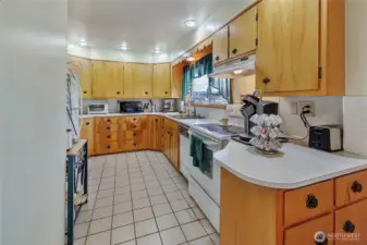 Kitchen with driveway window.