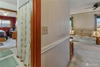 Entry to the right. Double doored bathroom looking into bedroom.