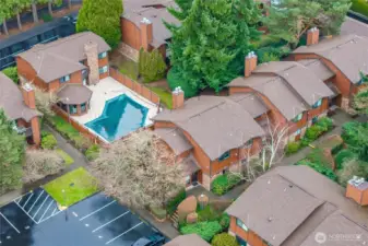 A community with clubhouse and outdoor swimming pool