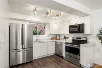 Newer kitchen with newer cabinets and quartz countertops