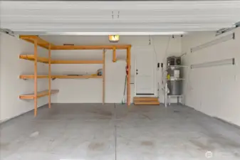 Garage with plenty of well-constructed and thought out storage.