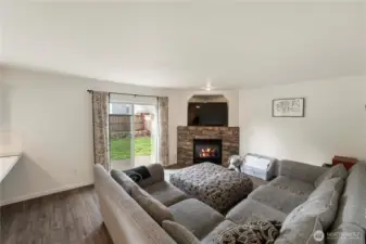 The cozy family room is adjacent to the kitchen.