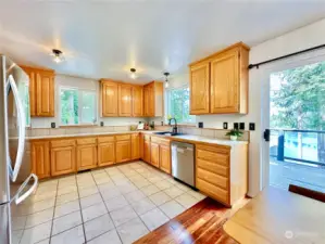 Spacious kitchen with views of the lake while you're washing dishes!