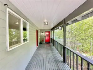 Large covered front porch in addition to the two huge decks overlooking the lake.