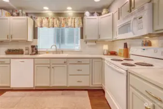 LVP flooring compliments the clean cream cabinetry.