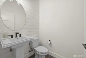 1/4 bath next to primary, utility and garage.