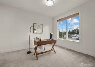Den with a view of the from yard
