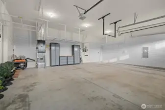 Lots of storage opportunities; slatted wall panels and overhead bins