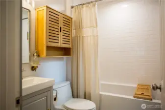Updated bathroom with marble flooring