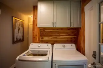 Cabinets above washer and dryer for convenience