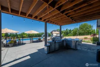 Lower covered patio, BBQ included in sale.