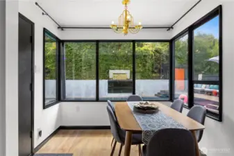 Dining space overlooks the pool. Such a convenient way to be inside and outside at the same time.